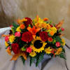 Accent any fall d&eacute;cor with this beautiful fall centerpiece. Bright fall colors