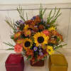 SUNFLOWERS WITH ASSORTED FALL FLOWERS IN 5&quot; CUBE (CUBE COLORS WILL VARY)