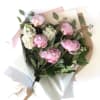 Seasonal beautiful peonies, wrapped with seasonal greens and blooms. Total of 5