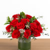 A timeless expression of love, our Romance and Red Roses arrangement features