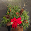 A beautiful and festive arrangement to place at a graveside or for