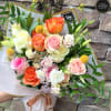 Soft warm colors wrapped in a high quality floral paper with satin