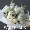 A timeless all-white bouquet, curated by our florist using the freshest seasonal