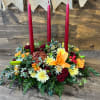 Say Happy Thanksgiving with this warm and inviting centerpiece full of elegant