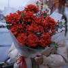 Bouquet of red French roses with branches of Ilex.

Standard - 12 rose