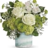 Reminiscent of a seaside garden, this gorgeous bouquet of white roses and