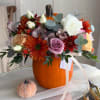Flower arrangement in a real pumpkin.

A flower arrangement in a real pumpkin