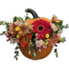 Pumkin flowers arrangement.

A flower arrangement in a real pumpkin will add a