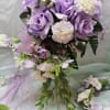 Silk bridal bouquet.
Lavender roses and white carnations and cascading greens.
Perfect for the