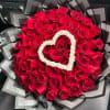 

Description:
A stunning hand-crafted bouquet featuring 50 premium red roses, beautifully arranged in