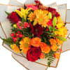 An autumn‑inspired bouquet of seasonal flowers, wrapped in elegant paper and crowned