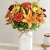 Get them buzzing for fall! Our unique, stylized bouquet is gathered with