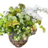 A lush medley of green blooms&mdash;dianthus, hellebores, anthuriums,phalaenopsis orchids, ranunculus, viburnum, and