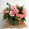 A Charming Touch of Sweetness
The &quot;Simply Sweetheart&quot; arrangement features tiny pink roses