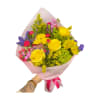A hand-tied bouquet bursting with yellow roses, bright asters, and pops of