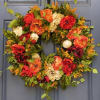 Celebrate the beauty of fall with our Autumn Peony Wreath, featuring lush