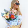 Our Sweet Blooms Gift Box features a petite designer&rsquo;s choice arrangement, paired