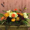 Type of Flowers: Fall Colored Flowers, Succulents and Autumn decorations in a