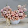 This new design features pink dahlias and peach colored roses in an