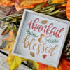 Send a Thanksgiving greeting card along with your gift. Style and sentiment