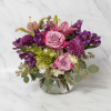 A beautiful mix of deep purples and soft lavenders. Features roses, lilies