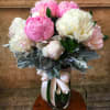 Bountiful assortment of Peonies with a touch of Dusty Miller along with