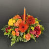 Lovely Vibrant Centerpiece with a candle to make your house feel warm.