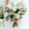 This stunning hand tied bouquet has a combination of Israeli Ruscus, Silver