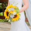Elevate your wedding with the Jenna Sunflower Wedding Bouquet. Stunning sunflowers, yellow