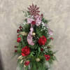 Recipe: Pine tree with red roses, mini carnations, and babies breath decorated