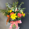 A beautifully selected bunch of the freshest flowers in a vase uniquely