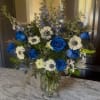 Beautiful canvas of Woodland greenery, rich, Bellarosa blue roses, white Anemone, Israeli