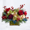 The Golden Yuletide Bliss arrangement captures the art of winter celebration in