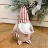 This little gnome is all decked out in his striped pajamas, ready