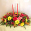 Grace you table with this lovely oblong centerpiece with candles. Fall color