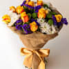Fire and Ice Wrapped Bouquet. Assorted fresh flowers including roses, statice and
