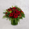 This gorgeous arrangement features one dozen red roses, spray roses, berries, pinecones