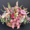 Our lovely basket arrangement is simply beautiful. Express love and sympathy in
