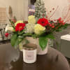 Beautiful basket of Roses 
,Cala Lillies and gerber daisies .This arrangement includes