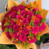 A radiant fall bouquet featuring fuchsia colored and orange roses, golden solidago