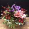 gathering of Christmas greenery,amaryllis,calla lily and  berries