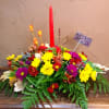Set your table with this exclusive Barlow Florist taper candle centerpiece! Let