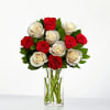 These precious roses in classic holiday colors are just the thing to