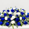 The Blue Horizon Casket Spray offers a beautiful tribute, blending hues of