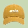 Bold and meaningful, this mustard yellow cap features JESUS with a cross