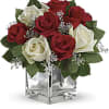 The perfect Christmas hostess gift, this exciting bouquet of red and white