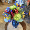 Like a smile in bloom, this arrangement overflows with happy color. Bright