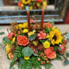 Adorn your holiday table with this seasonal mix of fall flowers and