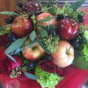 Beautiful bouquet made out of mainly apples will leave the recipient stunned.
