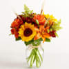 All-around arrangement with sunflowers, autumn-color roses, sunflowers, orange Asiatic lilies, and red